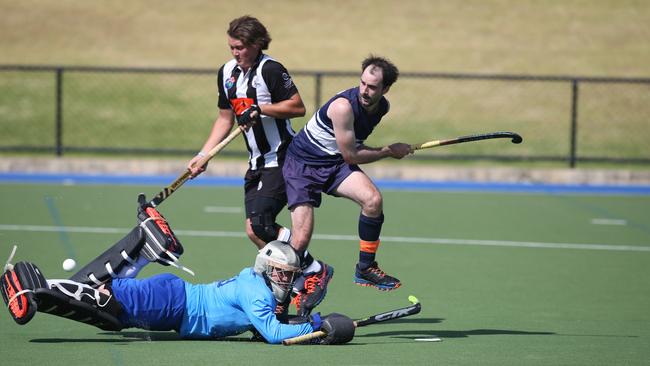 Port’s goal keeper Eddy Chittleborough tries desperately to stop a shot at goal by Forestville’s Jaykay Young. Picture: Dean Martin