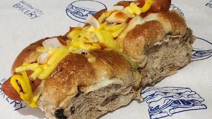 Brighton Jetty Bakery’s new hybrid hot cross hotdog. Picture: Brighton Jetty Bakery