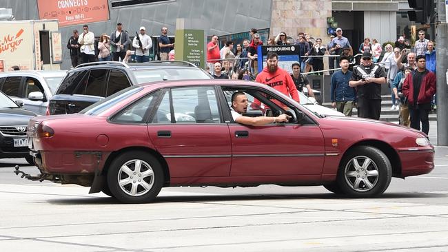 James Gargasoulas outside Flinders Street station shortly before the Bourke St rampage. Picture, Tony Gough