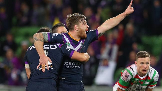 MELBOURNE, AUSTRALIA - SEPTEMBER 07:  Cameron Munster of the Storm celebrates kicking a drop goal during the NRL Qualifying Final match between the Melbourne Storm and the South Sydney Rabbitohs at AAMI Park on September 7, 2018 in Melbourne, Australia.  (Photo by Graham Denholm/Getty Images)