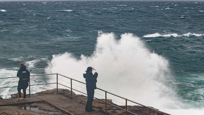 Hazardous surf warnings remain in place for some coastal regions. Picture: NCA NewsWire / Flavio Brancaleone