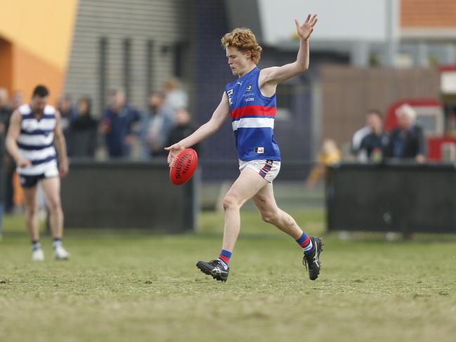 Matthew Caine kicks Mornington into attack. Picture: Valeriu Campan