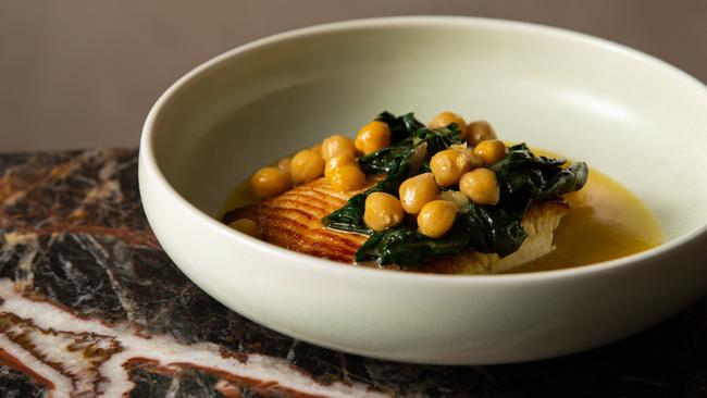 Roasted skate with silverbeet and chickpeas. Picture: Annika Kafcaloudis