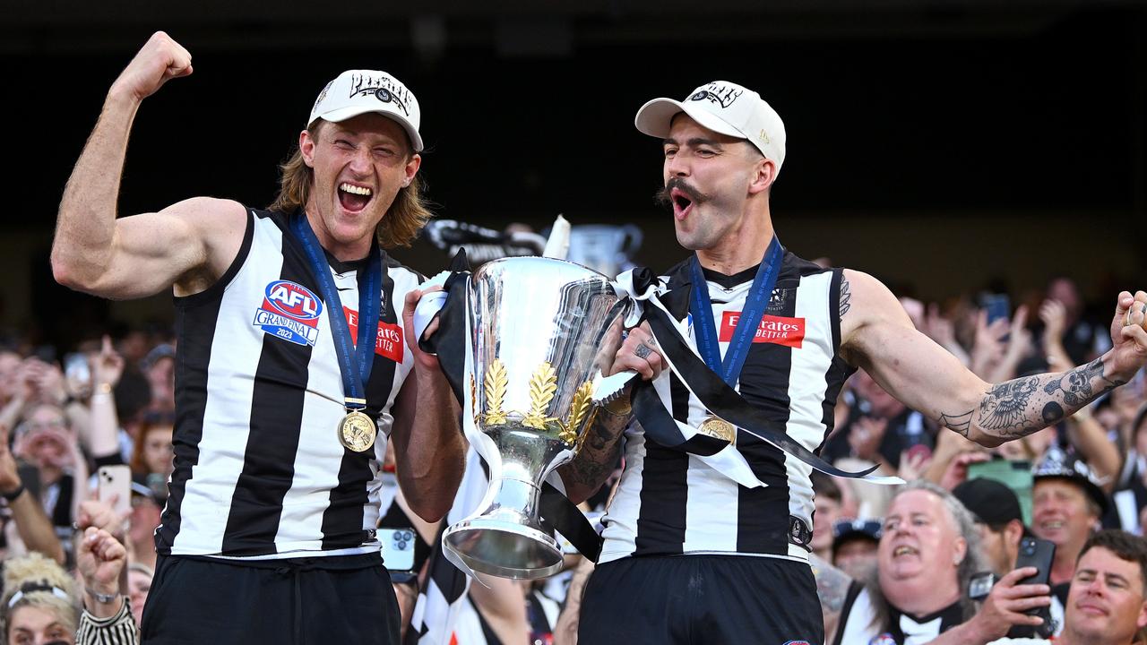 Murphy watched on as the Pies held on to win the flag, then got involved in the celebrations. Picture: Getty Images