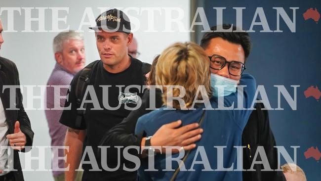 Bali Nine members Matthew Norman and Si Yi Chen arrive in Melbourne on Friday morning. Picture: Luis Enrique Ascui