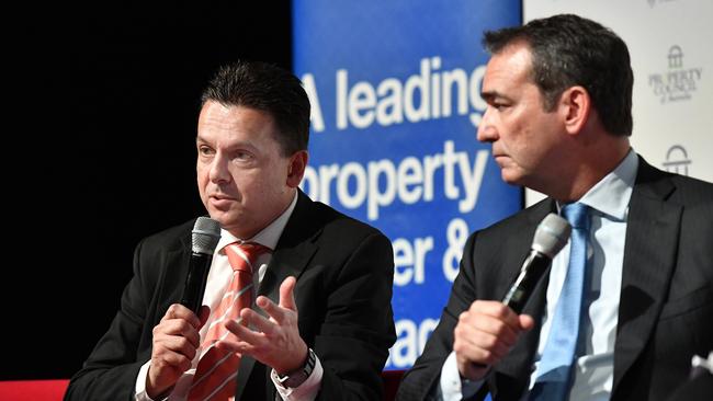 SA Best leader Nick Xenophon and Opposition Leader Steven Marshall at a leaders’ debate last week. Picture: AAP / Roy Vandervegt