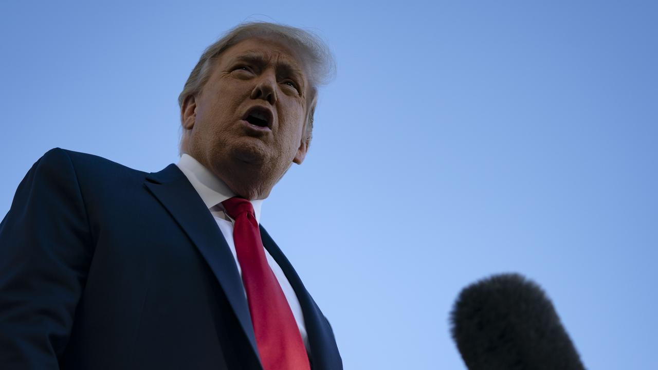 US President Donald Trump speaks with reporters at the White House on Saturday. Picture: Alex Edelman / AFP