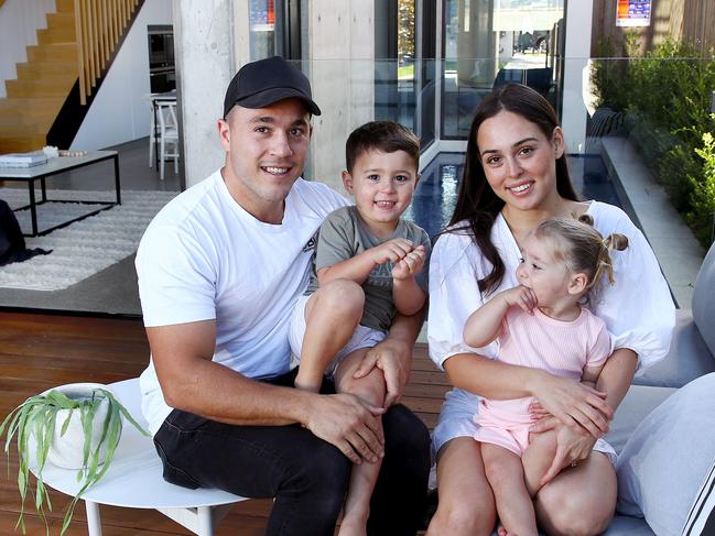 Emilio Mrakas with wife Alanna and kids Christopher 3 and Ariana 1 pictured at their Belmore house that is going to auction on Saturday in a bumper Sydney market where prices are rising. Picture: Toby Zerna