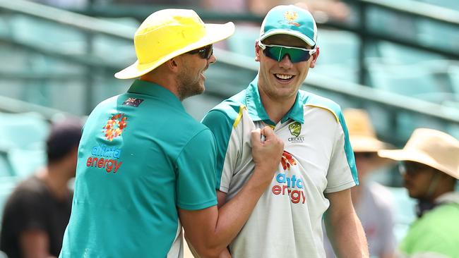 Josh Hazlewood and Cameron Green share a joke before the second ODI. Picture: Getty Images