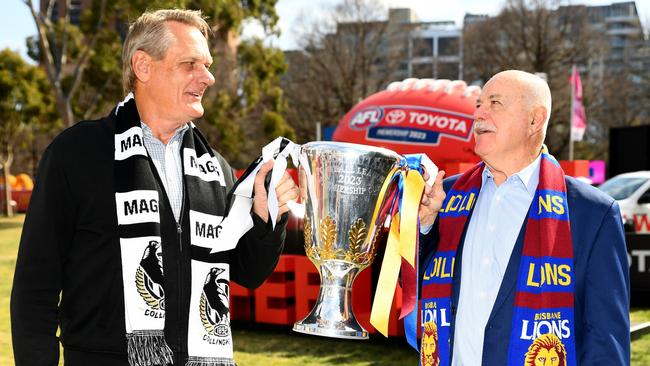 MELBOURNE, AUSTRALIA - SEPTEMBER 28: Peter Moore and Leigh Matthews pose with the premiership cup during the 2023 AFL Grand Final Premiership Cup Presenters Media Opportunity at the Melbourne Cricket Ground on September 28, 2023 in Melbourne, Australia. (Photo by Josh Chadwick/AFL Photos via Getty Images)