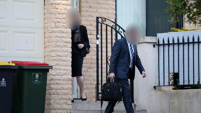 Federal agents leave the home of NSW Labor MP Shaoquett Moselmane in Rockdale on Friday. Picture: Jonathan Ng