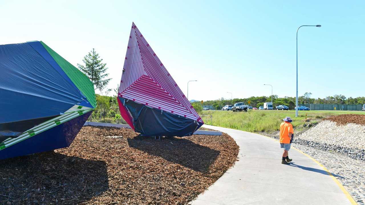 UNDER WRAPS: Graffiti on art installations at the entrance to the newly opened Bells Creek Arterial Road has been covered up. Picture: John McCutcheon