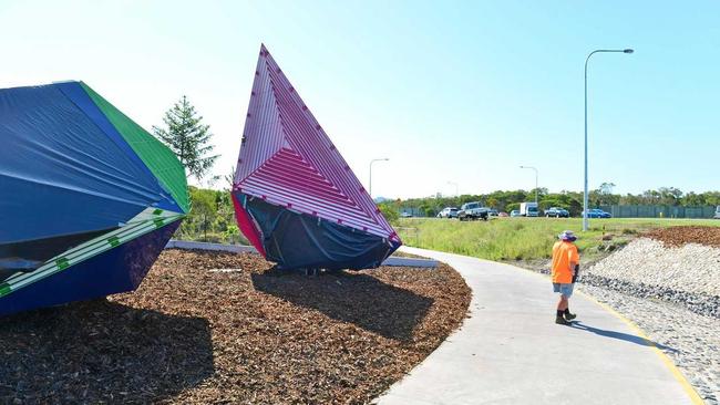 UNDER WRAPS: Graffiti on art installations at the entrance to the newly opened Bells Creek Arterial Road has been covered up. Picture: John McCutcheon