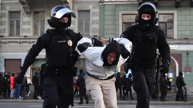 Police officers detain a man in Saint Petersburg on September 24, 2022, following calls to protest against the partial mobilisation announced by the Russian President. Picture: AFP