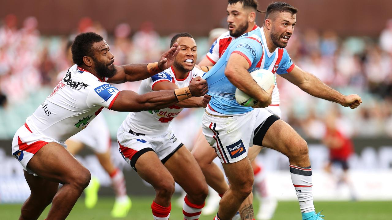 SYDNEY, AUSTRALIA - APRIL 25: James Tedesco of the Roosters is tackled during the round seven NRL match between the St George Illawarra Dragons and the Sydney Roosters at Sydney Cricket Ground, on April 25, 2022, in Sydney, Australia. (Photo by Mark Kolbe/Getty Images)