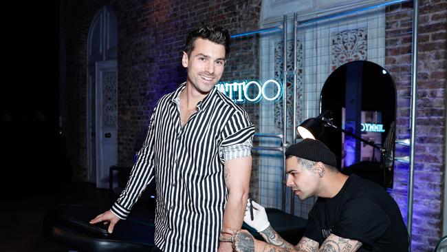 Matthew Johnson aka Matty J gets personalised tattoo at the Jimmy Choo "Urban Hero" Australia Launch Party on November 19, 2019 in Sydney, Australia. (Photo by Hanna Lassen/Getty Images for Jimmy Choo)