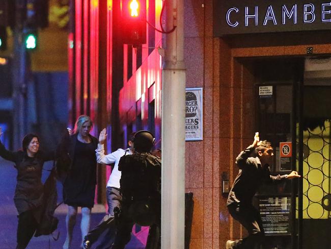 Left to right: Harriet Denny, Julie Taylor, and Joel Herat. They were in the group of six hostages to escape the cafe before the end of the siege. Picture: Joosep Martinson/Getty Images