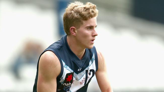 MELBOURNE, AUSTRALIA - JUNE 24:  Tom McKenzie of Vic Metro runs during the U18 match between Vic Country and Vic Metro at Melbourne Cricket Ground on June 24, 2018 in Melbourne, Australia.  (Photo by Robert Prezioso/AFL Media/Getty Images)