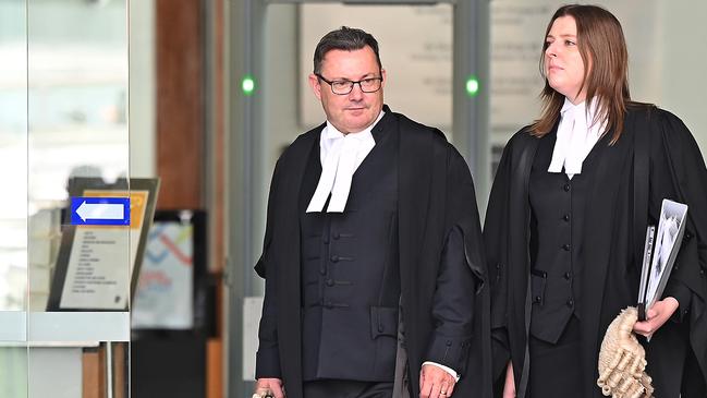 Crown prosecutor Mark McCarthy (centre) leaves the Supreme Court. Picture: NCA NewsWire / John Gass