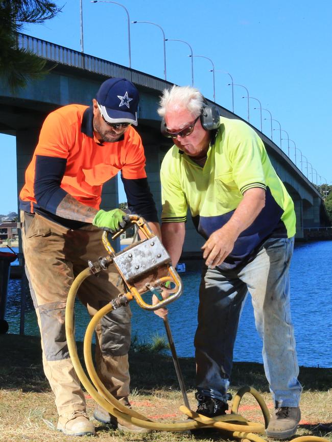 Work begins underneath the Captain Cook Bridge as part of the Bradfield F6 project.