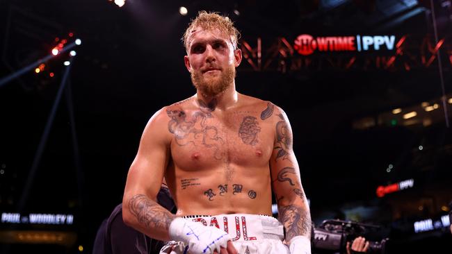 Jake Paul reacts to knocking out Tyron Woodley. Photo by Mike Ehrmann/Getty Images