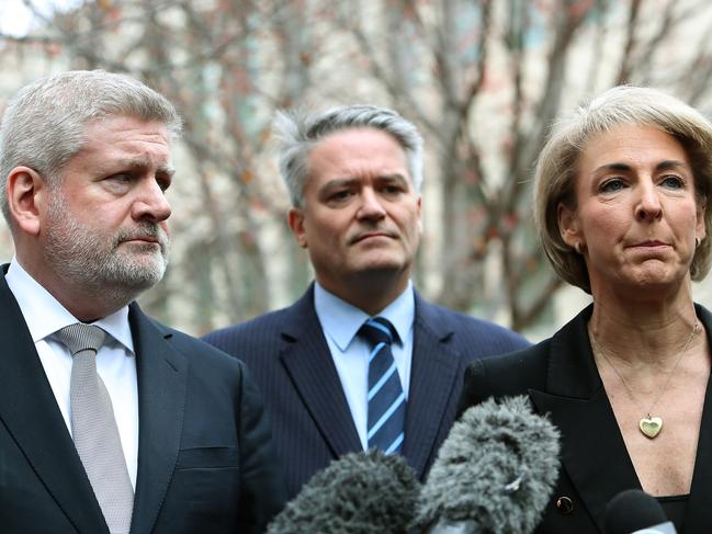 Mitch Fifield, Mathias Cormann and Michealia Cash holding a press conference at Parliament House in Canberra. Picture: Kym Smith