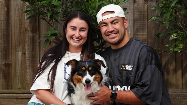 V Weekend. Melbourne Storm star and reigning Dally M winner Jahrome Hughes at his Kew home with wife Molly and their dog Honey.                                                              Picture: David Caird