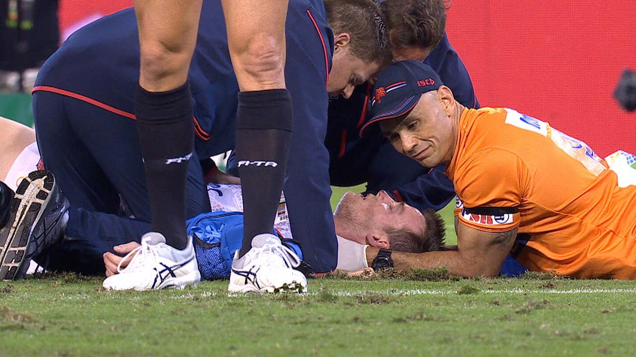 Luke Keary receives attention after a heavy knock.