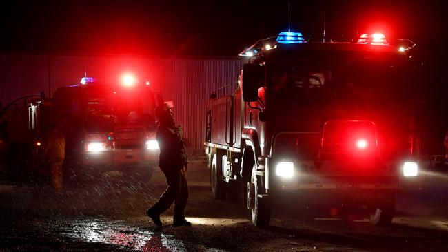 Rural Fire Service firefighters conduct property protection at the Dunns Road fire on January 10 in Mount Adrah. Picture: Sam Mooy/Getty Images