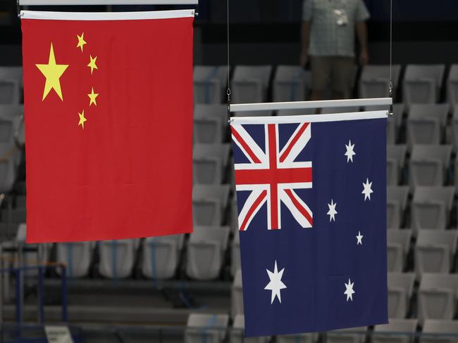 The flags of Team USA, Team China and Team Australia during the medal ceremony of the 4 x 200m Freestyle Relay final on day six of the swimming competition ofatthe Tokyo 2020 Olympic Games. Picture: Jean Catuffe/Getty Images