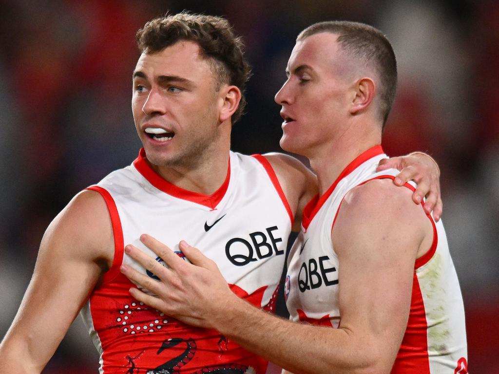 MELBOURNE, AUSTRALIA - MAY 23: Will Hayward and Chad Warner of the Swans celebrate a goal during the round 11 AFL match between Western Bulldogs and Sydney Swans at Marvel Stadium, on May 23, 2024, in Melbourne, Australia. (Photo by Morgan Hancock/Getty Images)