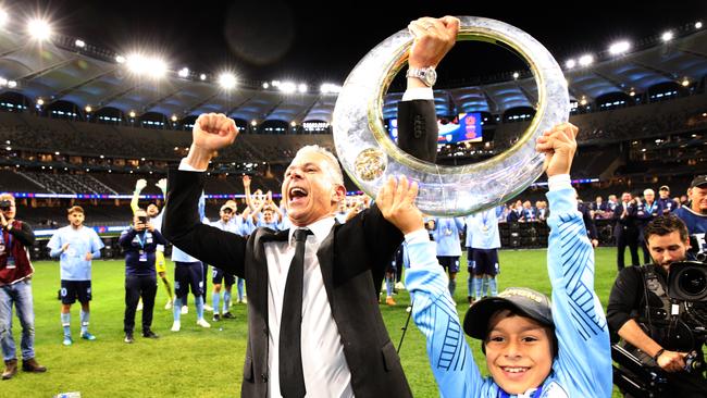 Sydney FC took home the title last year, under coach Steve Corica (C). Can they do it again? Picture: AAP