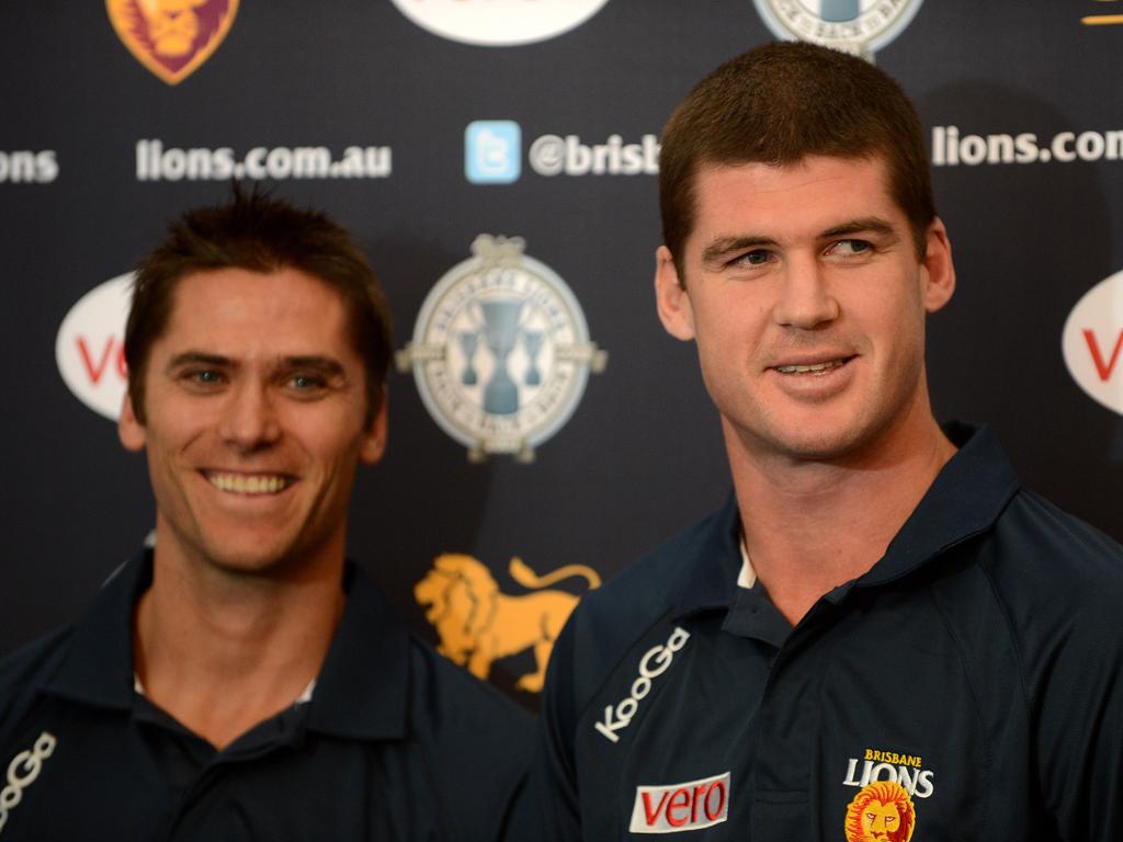 Jonathan Brown (right) and Simon Black won three successive grand finals with the Lions a the MCG. Picture: AAP Image/Dan Peled