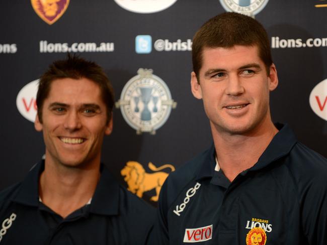 Jonathan Brown (right) and Simon Black won three successive grand finals with the Lions a the MCG. Picture: AAP Image/Dan Peled