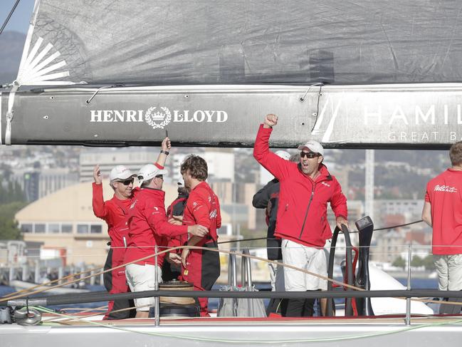 Wild Oats XI skipper Mark Richards raises his fist in triumph after clinching line honours in the 2018 Sydney-Hobart yacht race. Picture: RICHARD JUPE
