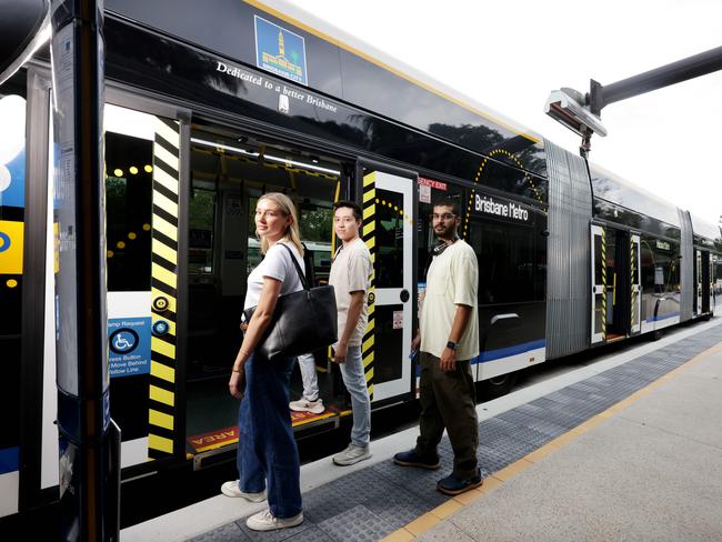 Ava Kenafake from Sheldon, Brandon Loon from Toowong and Aviral Sharma from St Lucia use Brisbane Metro. Picture: Steve Pohlner