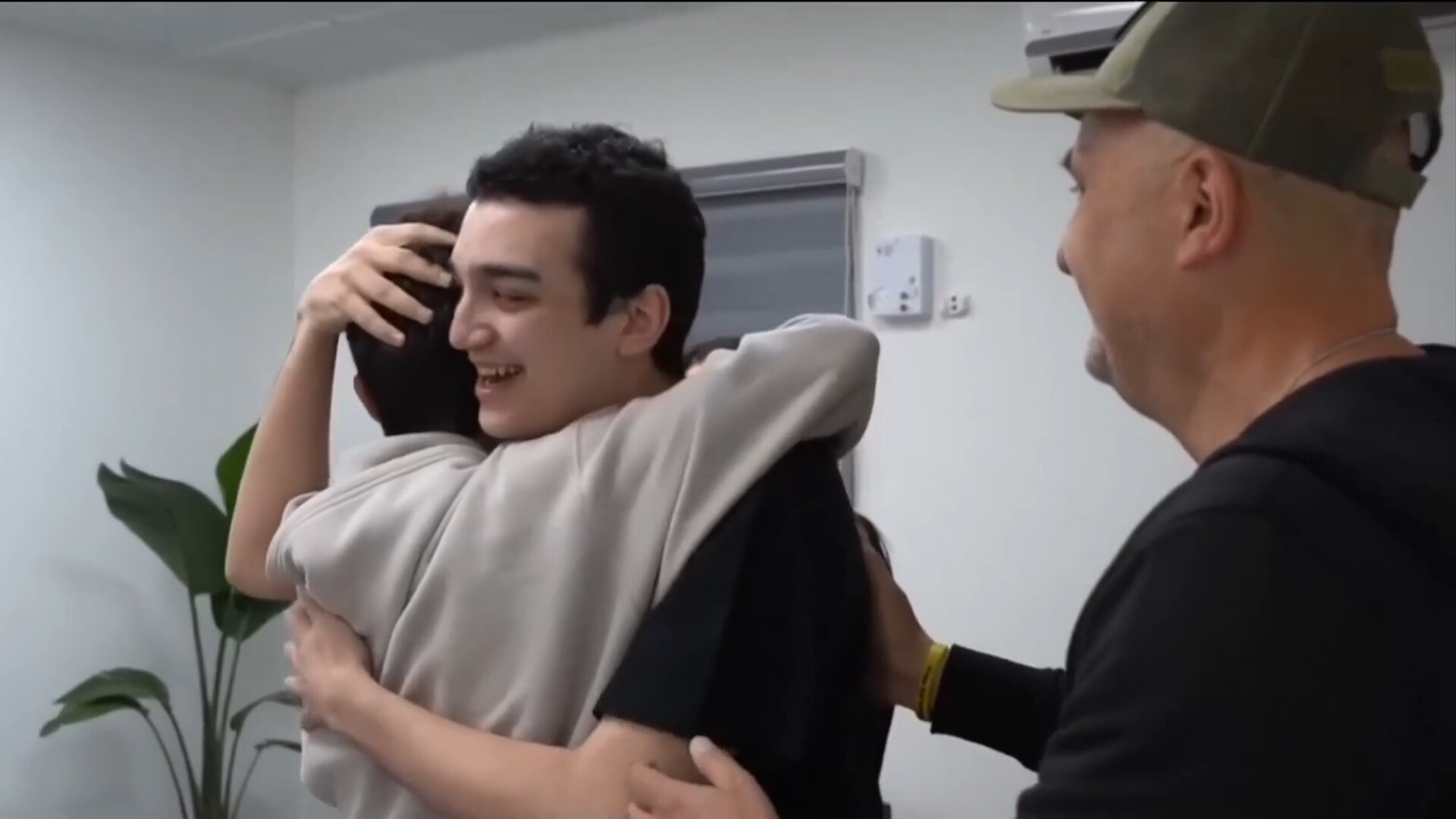 Freed Israeli-American hostage reunites with family
