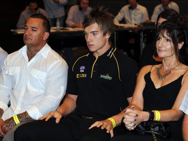 A nervous Dustin Martin in at the 2009 AFL Draft, just before his name was called out, with dad Shane and mum Kathy.