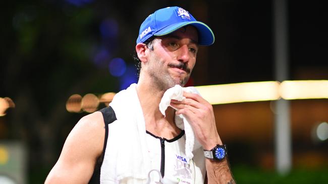 SINGAPORE, SINGAPORE - SEPTEMBER 22: 18th Placed Daniel Ricciardo of Australia and Visa Cash App RB looks on in the Paddock after the F1 Grand Prix of Singapore at Marina Bay Street Circuit on September 22, 2024 in Singapore, Singapore. (Photo by Rudy Carezzevoli/Getty Images)