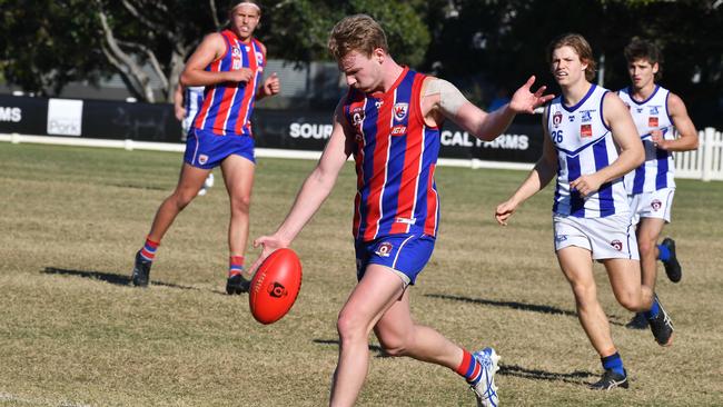 Wilston player Jack Lipscombe gets a kick away. Picture, John Gass