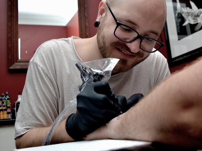 Josh Darkly at work. Picture: Bernard Humphreys