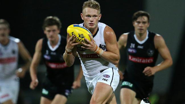 Adam Treloar is back for the Magpies. Picture: Michael Klein