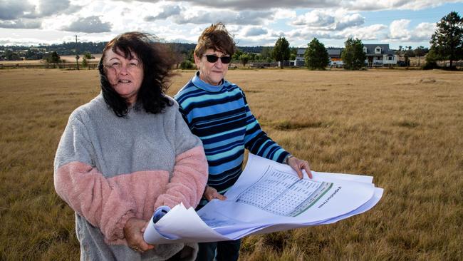 Karen Mansbridge and Desley Benecke on Ms Mansbridge's property which neighbours the location of Kingaroy Solar Farm set to begin construction in August 2022. Picture: Dominic Elsome