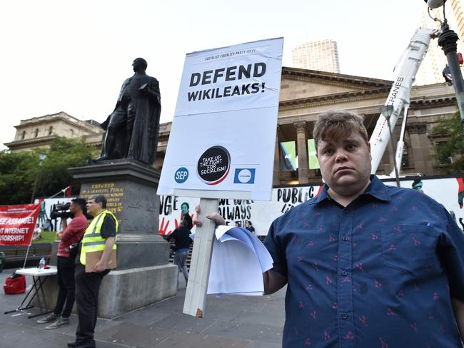 Supporters of WikiLeaks founder Julian Assange rally outside the Victorian State Library in Melbourne. Picture: AAP