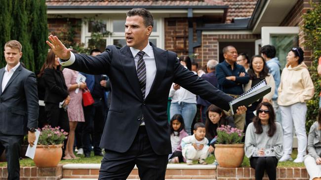 Auctioneer Troy Malcolm sells a Sydney home for 5,525,000 dollars, well over the reserve. Picture: NCA NewsWire / David Swift