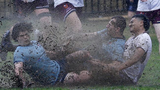 The conditions were testing on the opening day of the Australian Schools rugby championships at Knox. Pic: John Appleyard