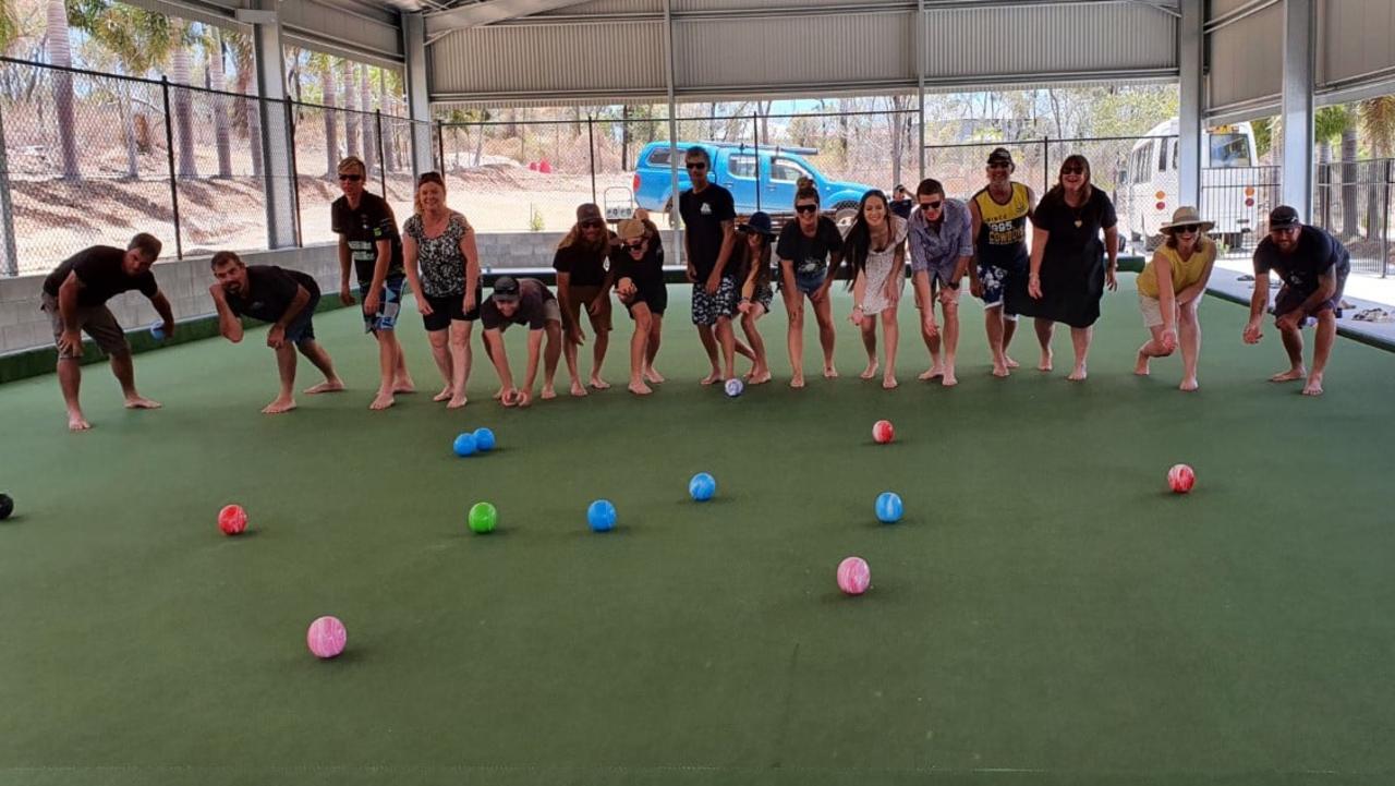 Residents tested their skills at the opening of the new bowls green at Hydeaway Bay. Picture: Supplied