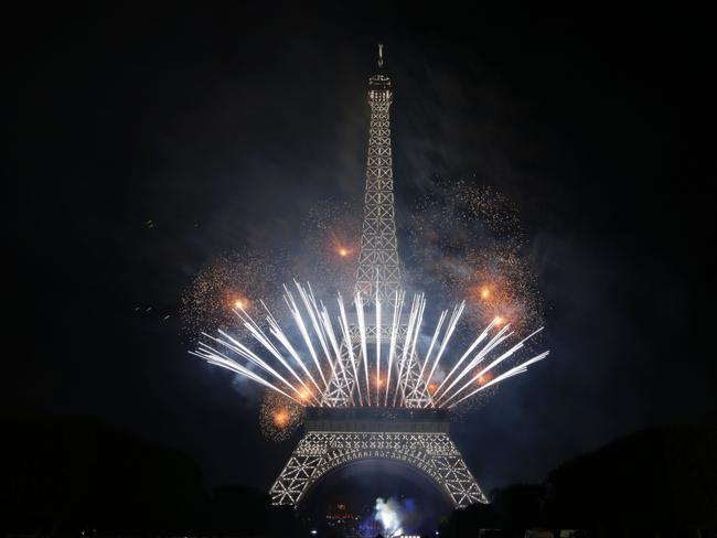 Earlier that night fireworks lit up the skies above the Eiffel Tower as part of France's annual Bastille Day celebrations. Picture: Geoffroy Van Der Hasselt/AFP