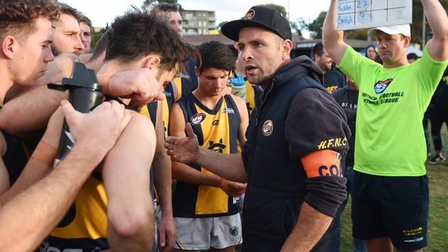 Hurstbridge coach Jarrod Tilley talks to his players. Picture: Josie Hayden