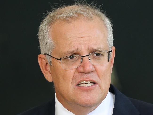 SYDNEY, AUSTRALIA - NewsWire Photos, FEBRUARY 02 2022: Prime Minister Scott Morrison visits the RAAF base at Richmond and addresses the media during a press conference in Sydney. Picture Gaye Gerard / NCA Newswire.